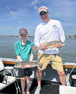 Fishing Charters 14 2 redfish caught in St. Augustine Fl