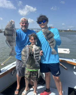 Fishing Charters 13 Family catching black drum in St. Augustine Fl